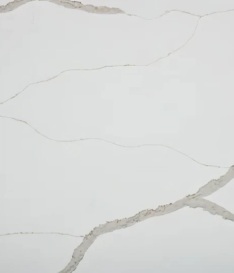 White marble surface with subtle gray veins.